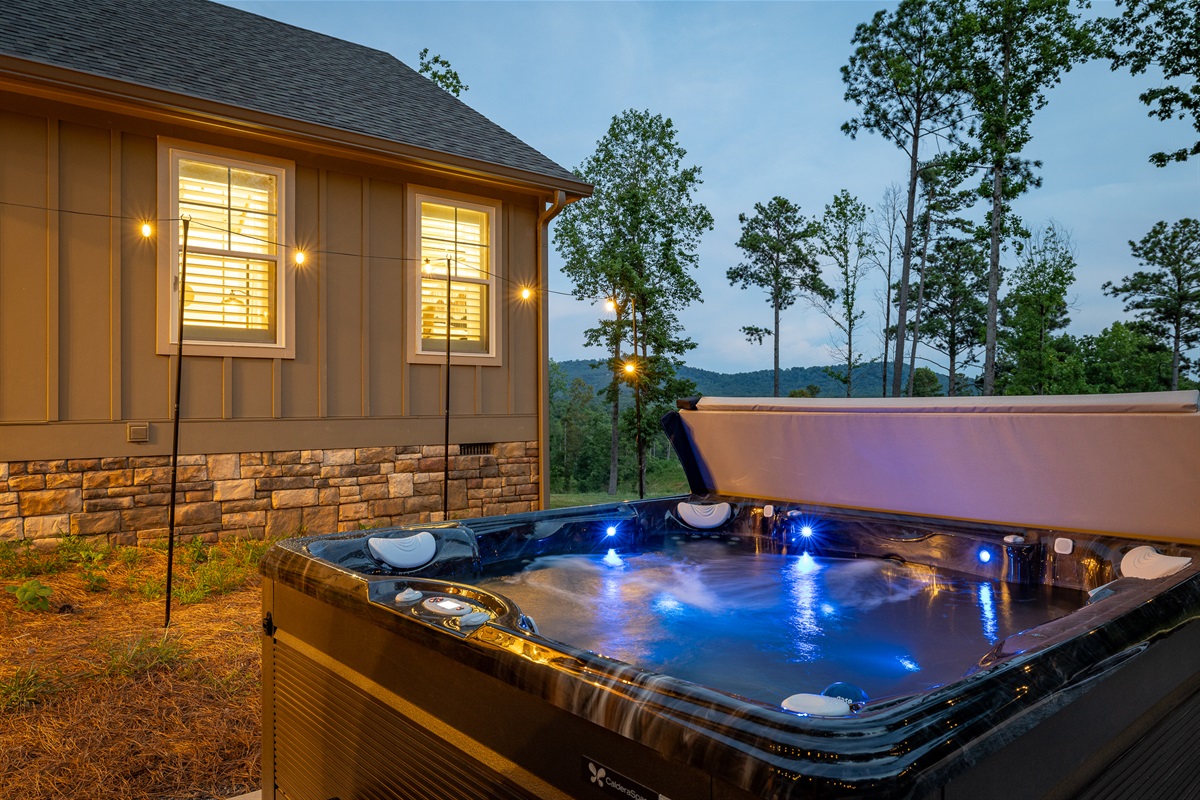 Sink into the hot tub as the night unfolds, this is your moment to truly unwind.
