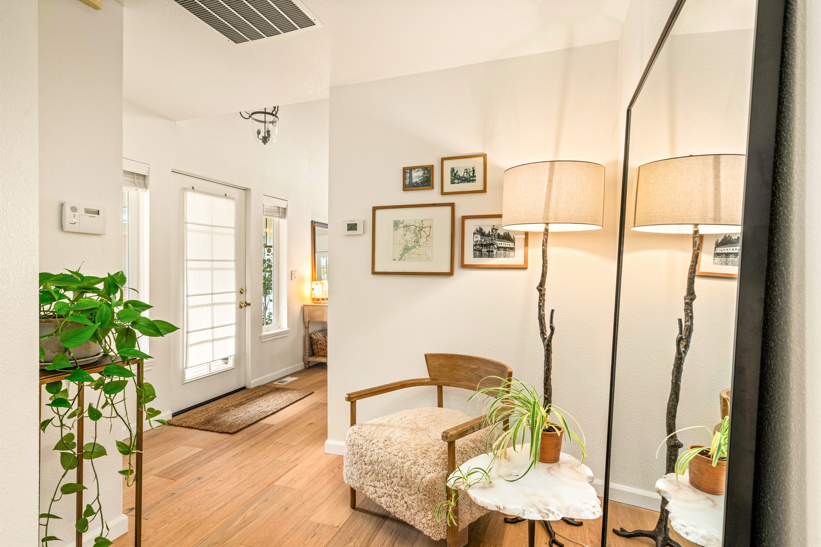 Looking towards the entry: historic Lake Steilacoom photos line the halls.