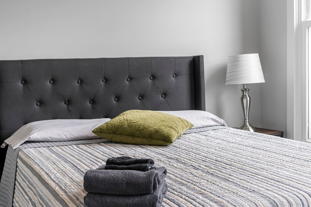 Fresh linens, extra pillows, and towels await you for a comfortable stay.