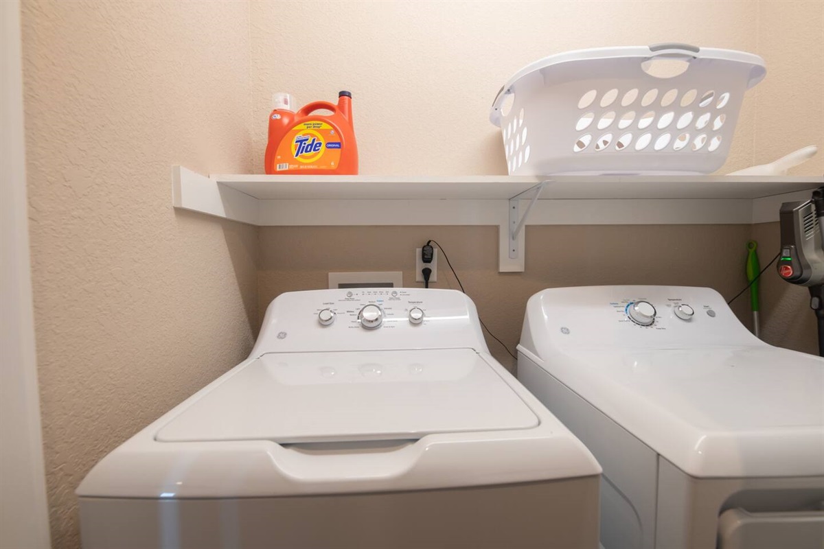 Home has washer, dryer, laundry basket, iron and ironing board.   