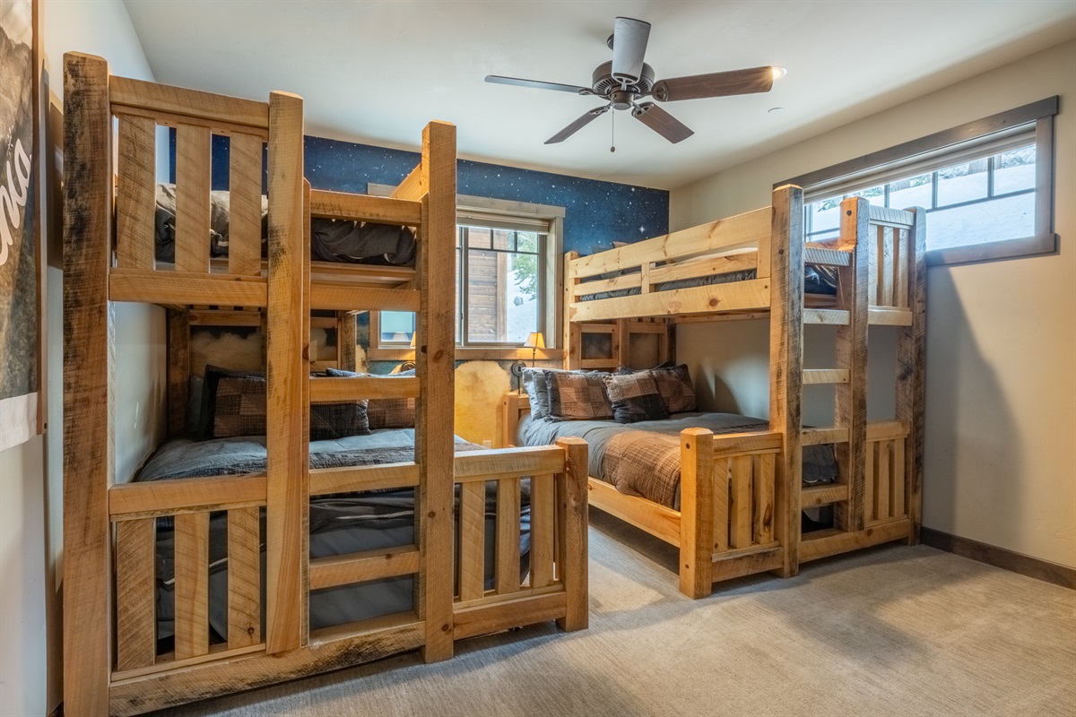 Two queen-over-twin XL timber bunks—built strong and stable enough for adults, not just kids.