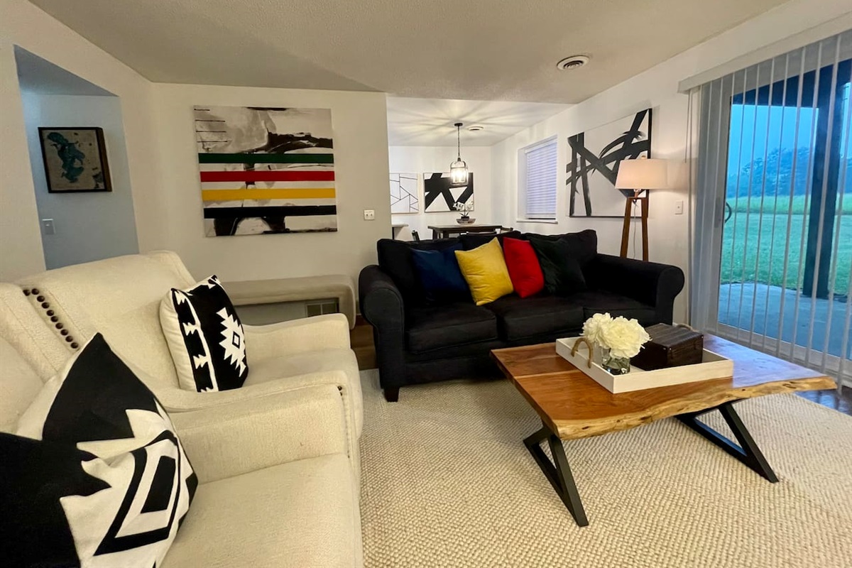 Living room view to eating area.