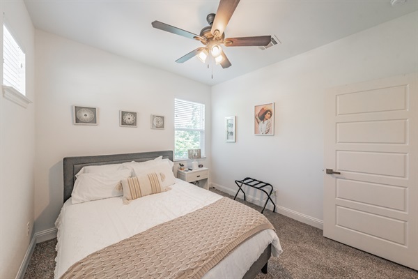 Guest bedroom #2 with queen bed and smart TV