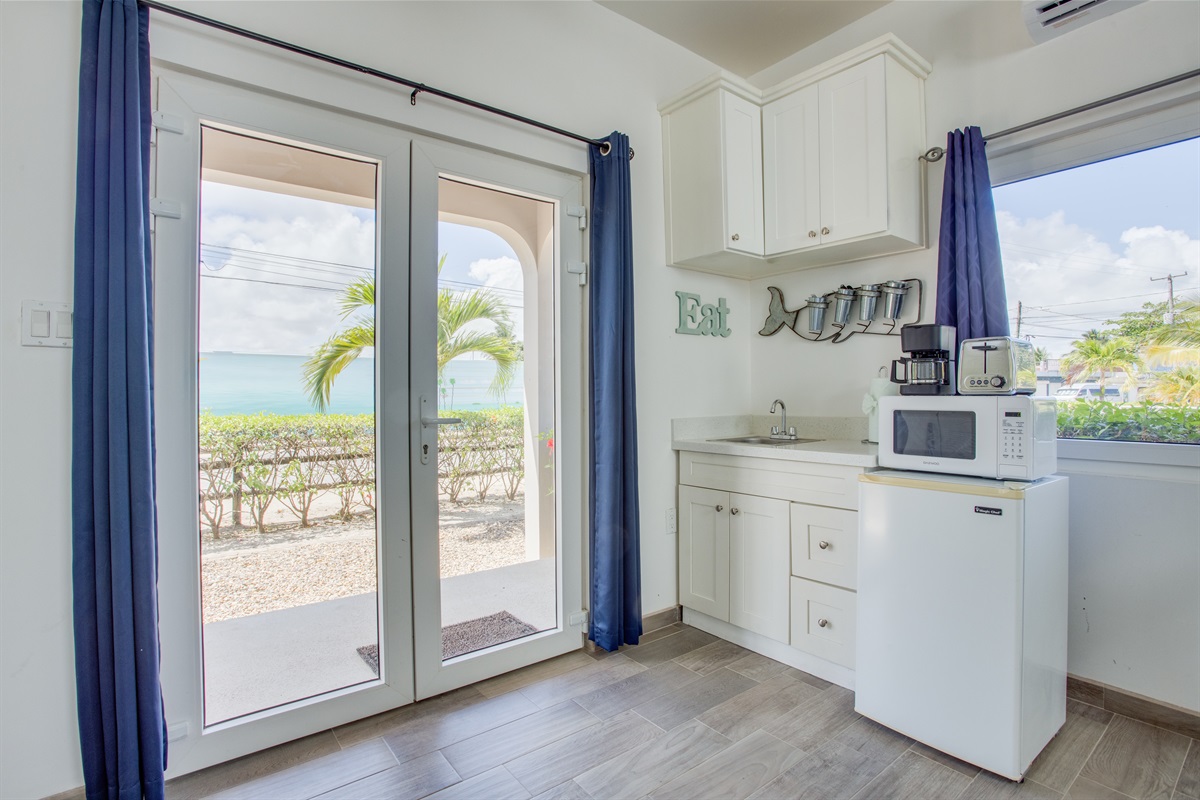 kitchenette - microwave, toaster, coffee maker, mini fridge.
