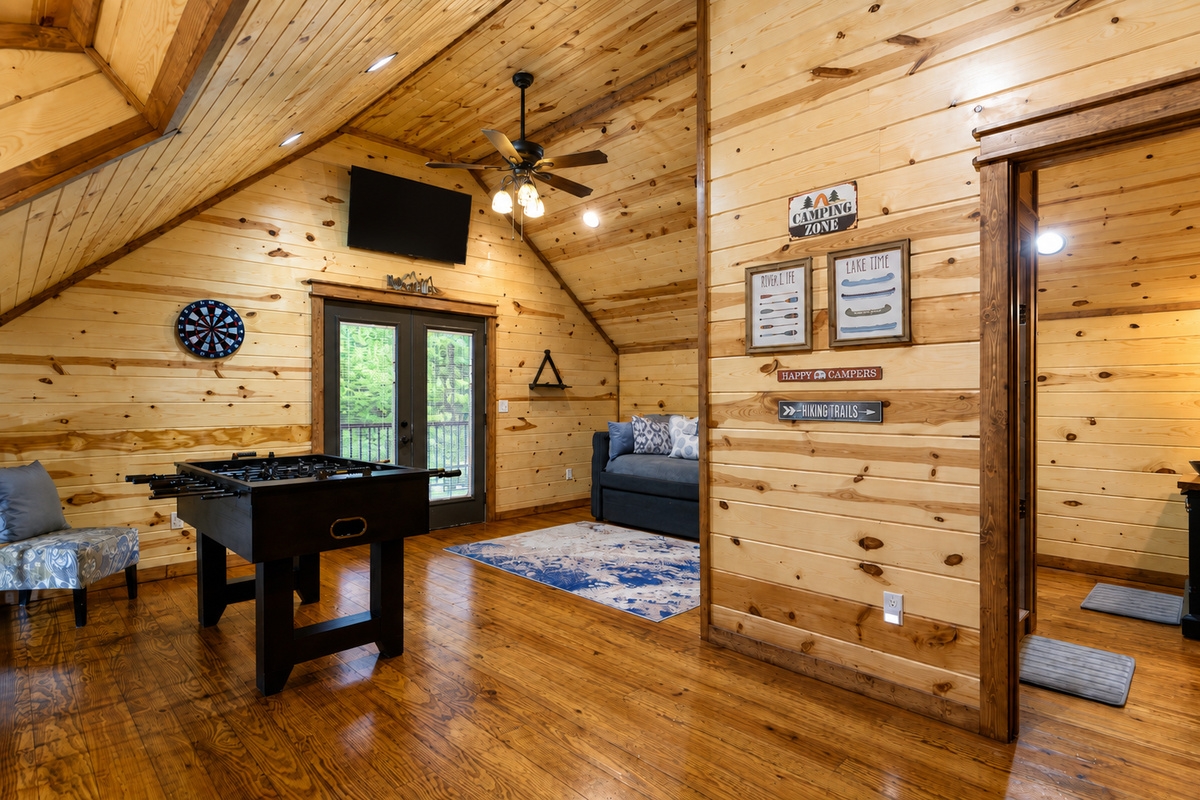 Game Room: Enjoy friendly competition with foosball and a view in this charming hideaway!