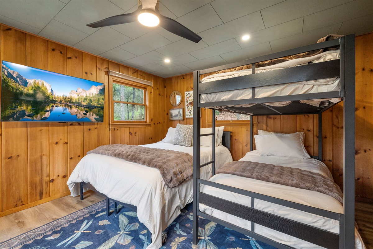 Bunk room twin bunk beds and queen bed. Games are included in the closet and beds have new memory foam mattresses. TV on the wall with an attached HDMI cord.