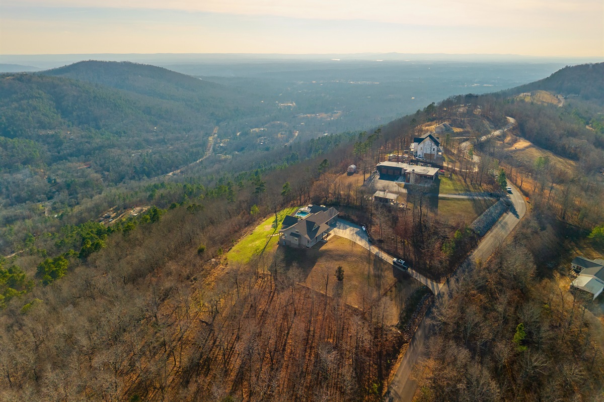 The surrounding landscape stretches for miles, reminding you just how peaceful and secluded this mountaintop retreat truly is.