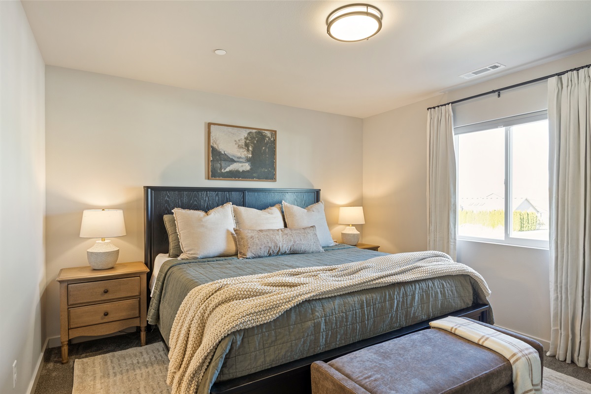 Primary Bedroom | King Size Medium Firm Mattress | Cotton Sateen Sheets | Blackout Curtains