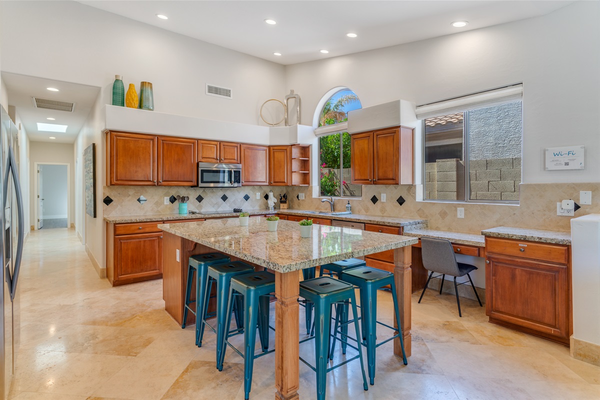 Great open concept! Built in desk/chair is along the side wall - convenient!