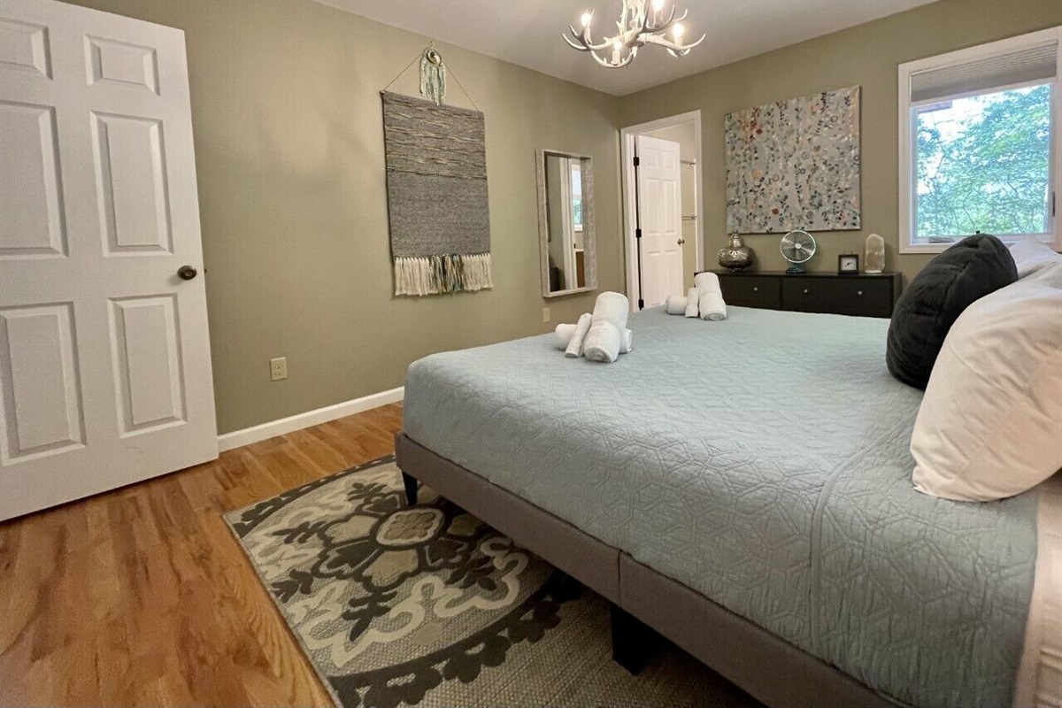Master bedroom with door to en suite bath