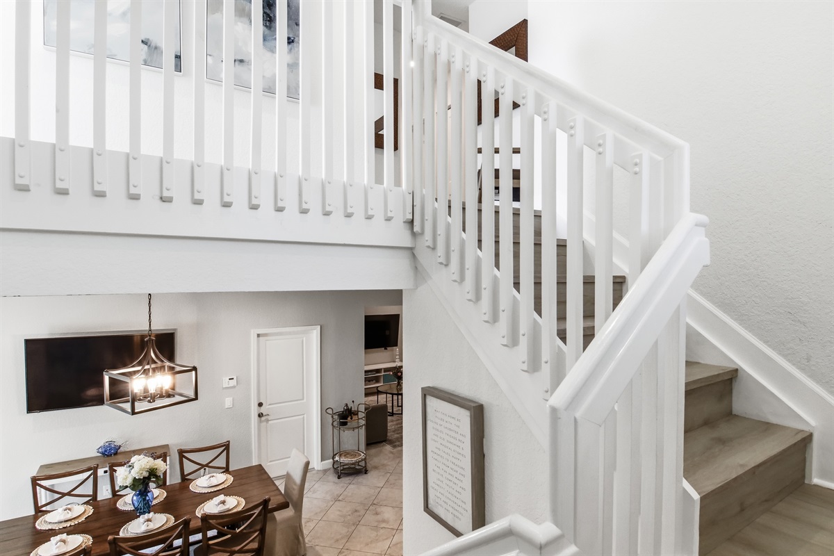 The second floor has 2 king bedrooms, 1 queen bedroom, 2 bathrooms, a laundry room and balcony access