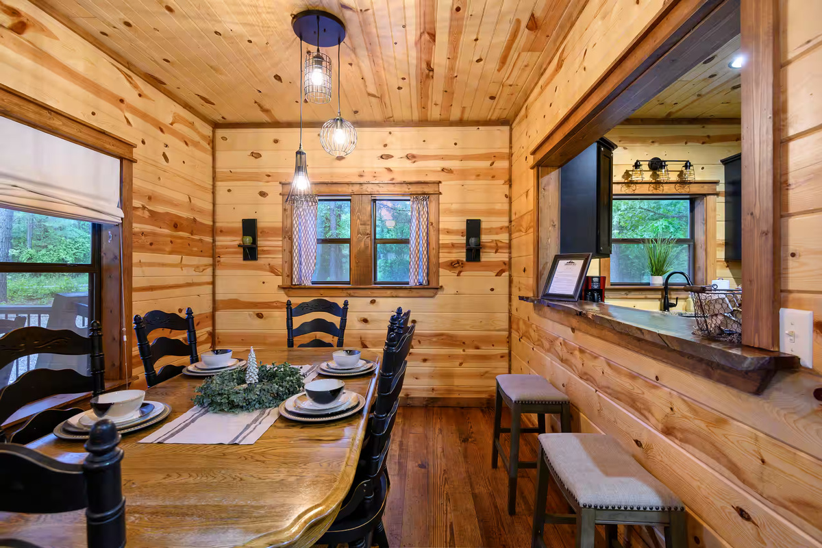 Dining Room: Gather around the rustic table, where every meal becomes a cherished memory!