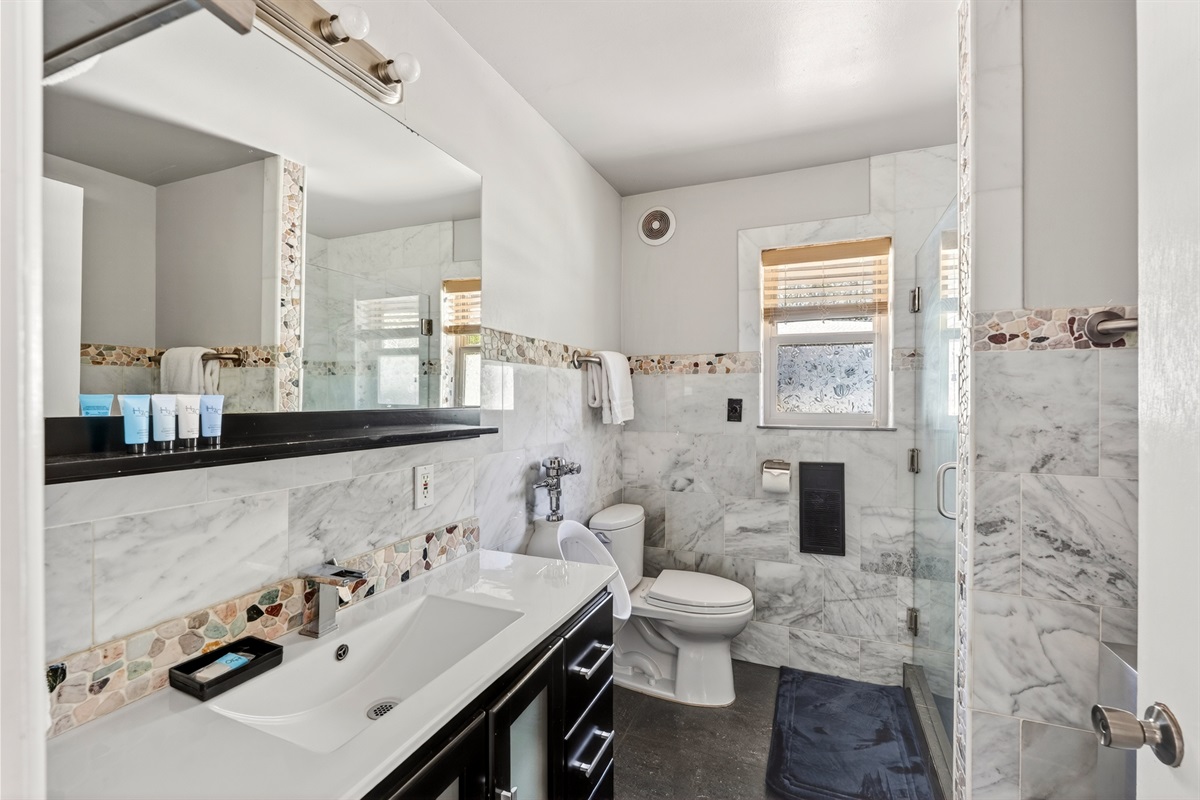 Convenience and Style: Downstairs Full Bathroom with Men's Urinal