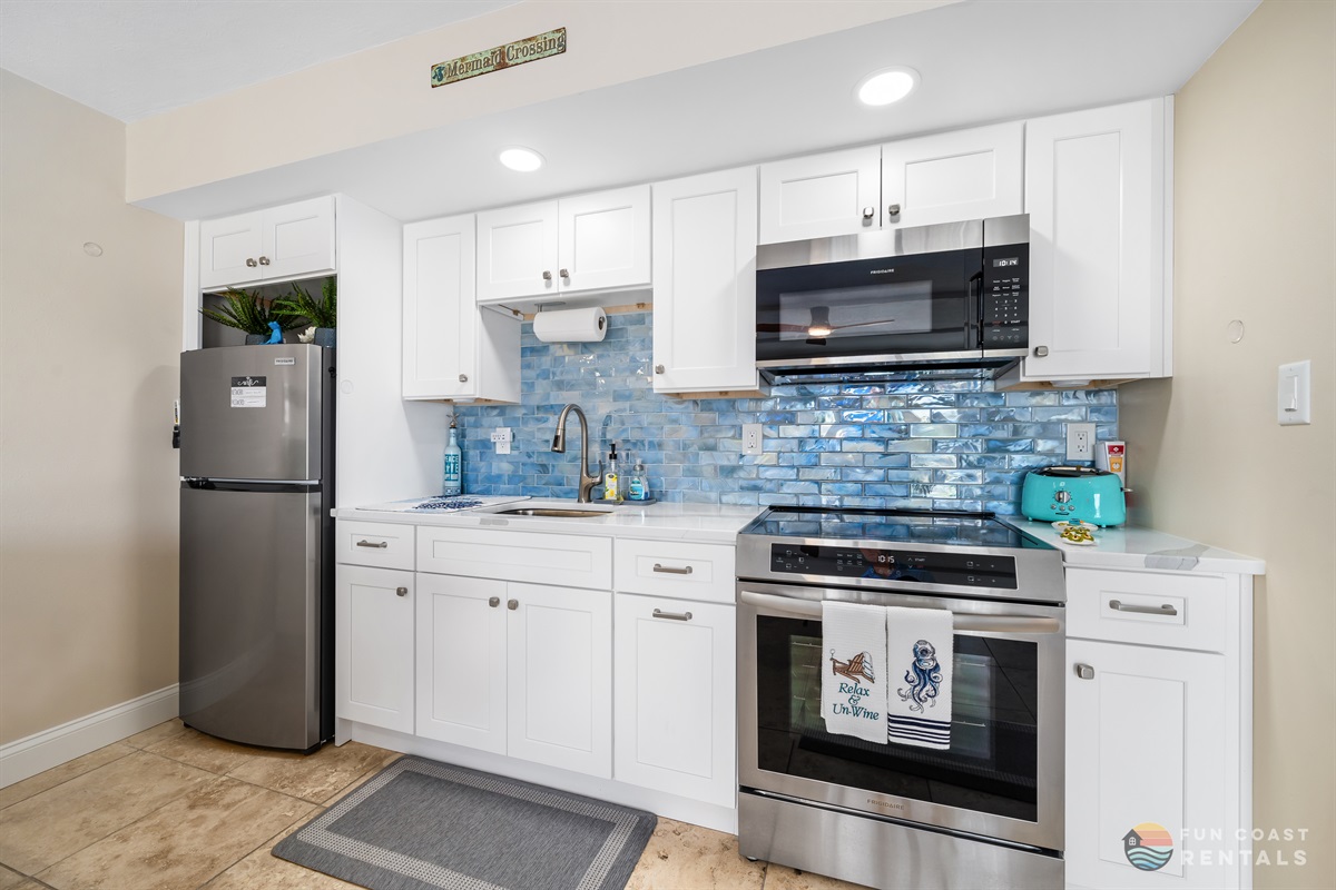 Modern Stainless Steel Kitchen with Island Dining