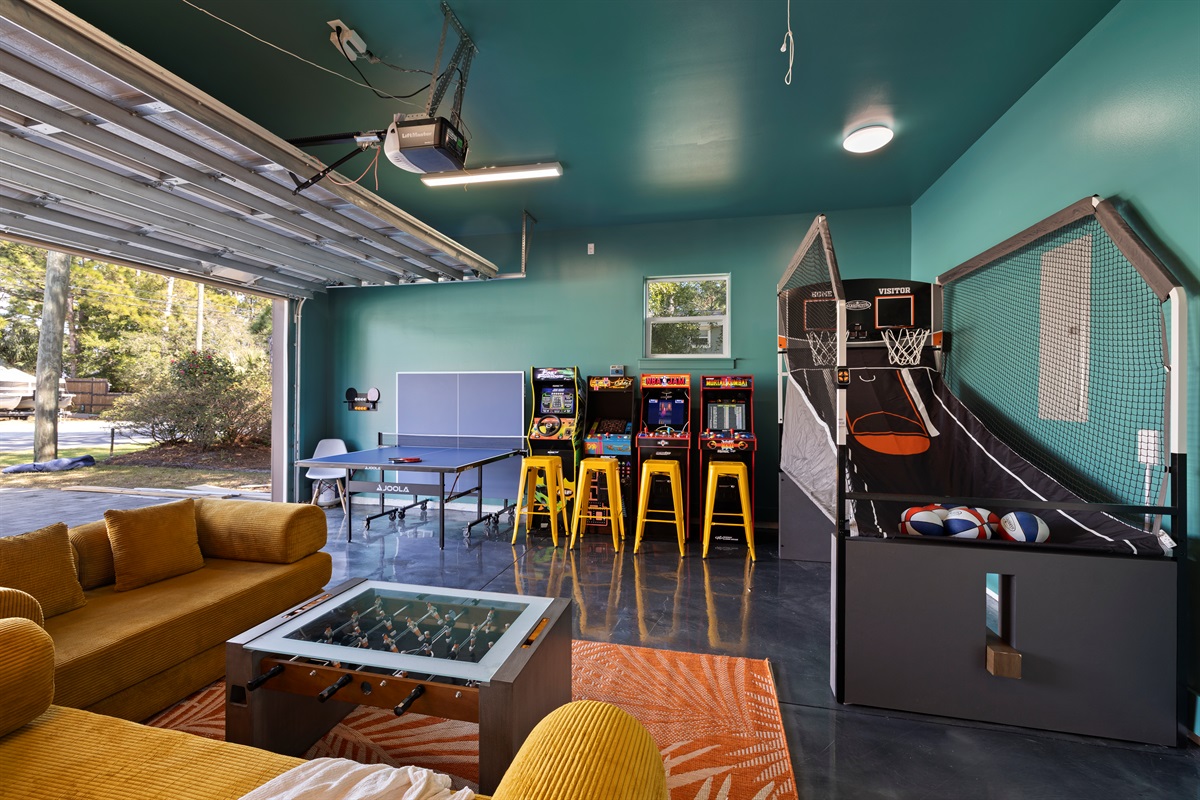 Epic Garage Game Room – Ping pong, arcade classics, basketball hoops, foosball, shuffleboard, and room for everyone to play at once.