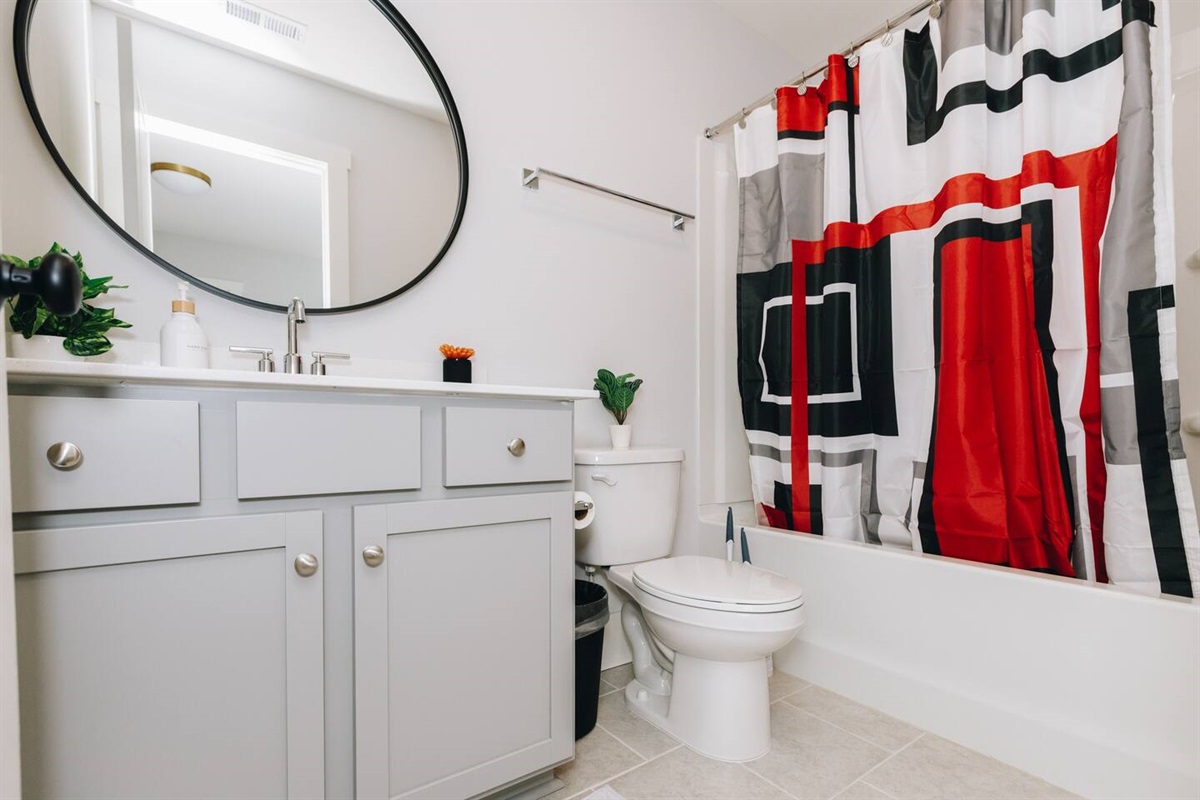 Full bathroom with a shower and tub