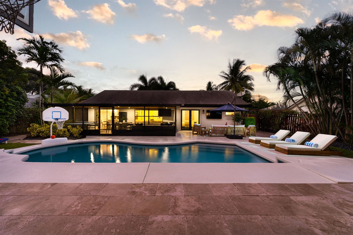 Cool off in the crystal-clear pool or bask in the sun on the loungers &mdash; perfect for both relaxation and play.