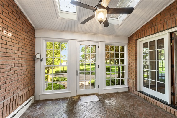 Sunroom (space for extra dining table and chairs )