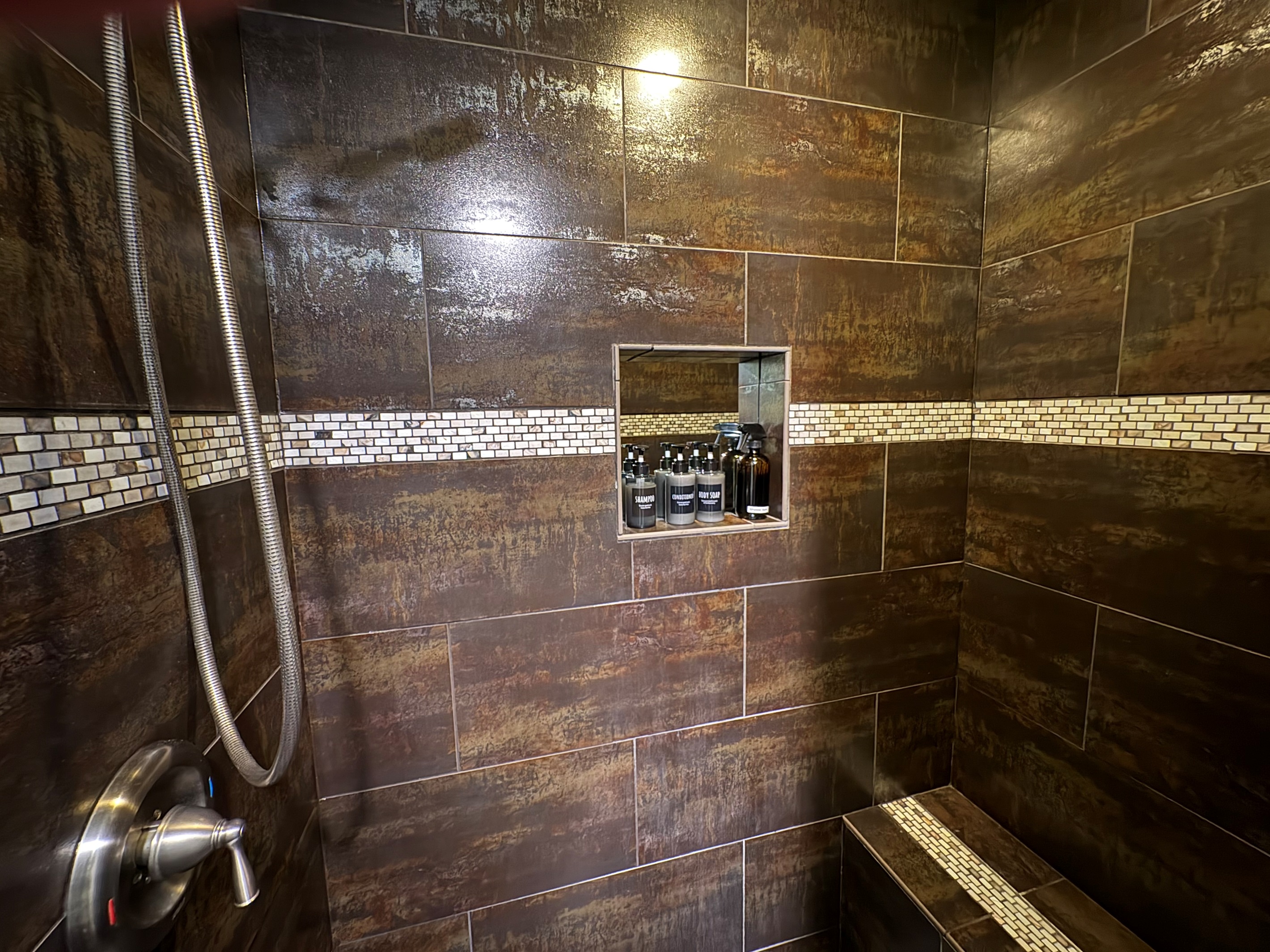 WC1 — Ruck Room shower with bench.