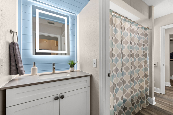 Spacious bathroom with attached closet
