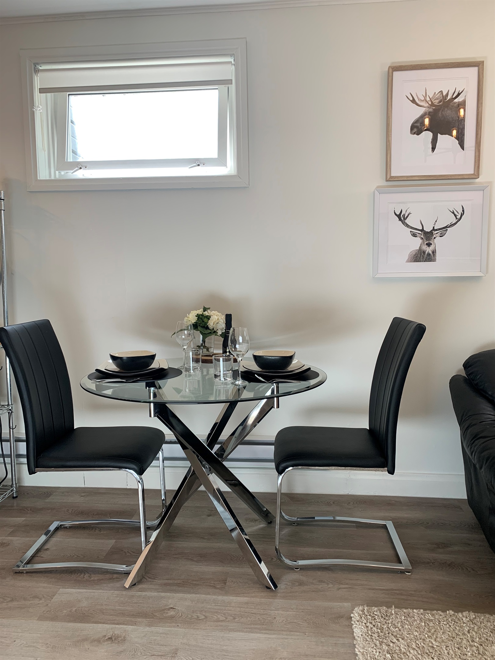 The perfect spot for a meal at home or late-night work session in this charming basement suite dining area.