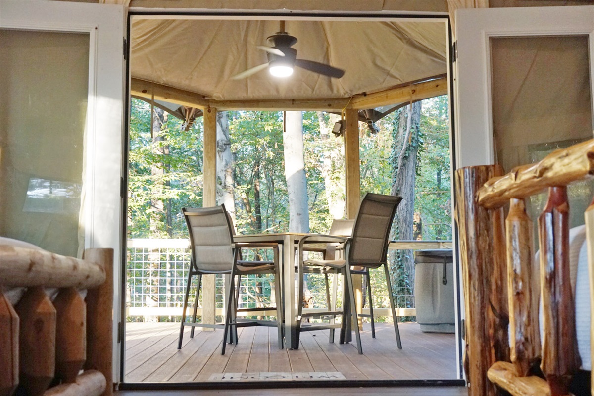 Enjoy meals with nature views and gentle breezes in this charming retreat!