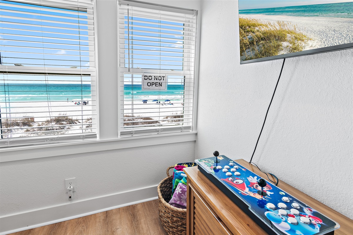 Sea Winds 8 - The 1st Floor features another Living Room w/ 65" Smart TV + multi-game arcade!