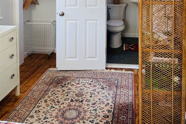 Bedroom looking into bathroom
