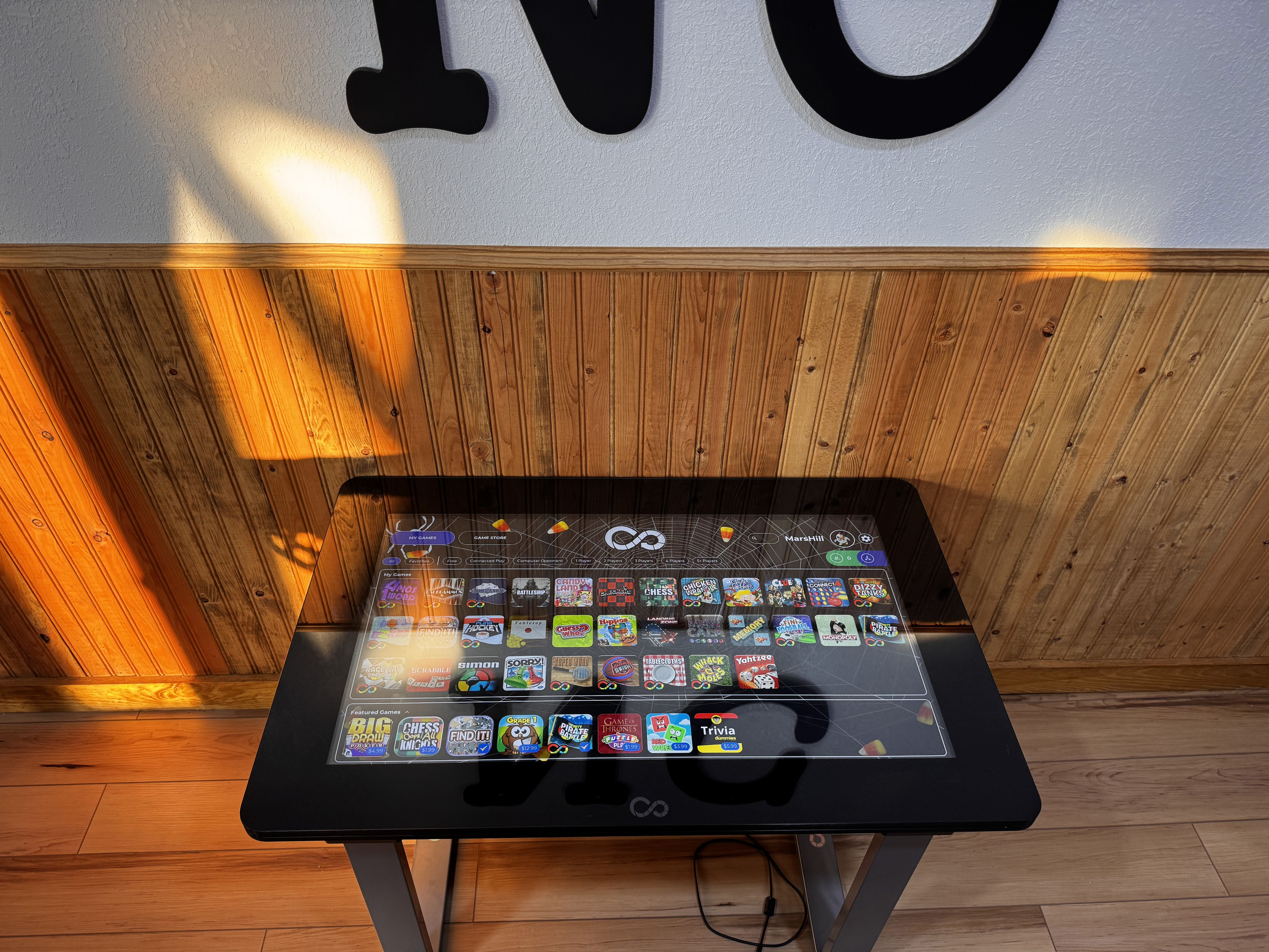 Infinity Game Table offers a huge selection of digital board games and family entertainment without boxes or missing pieces.