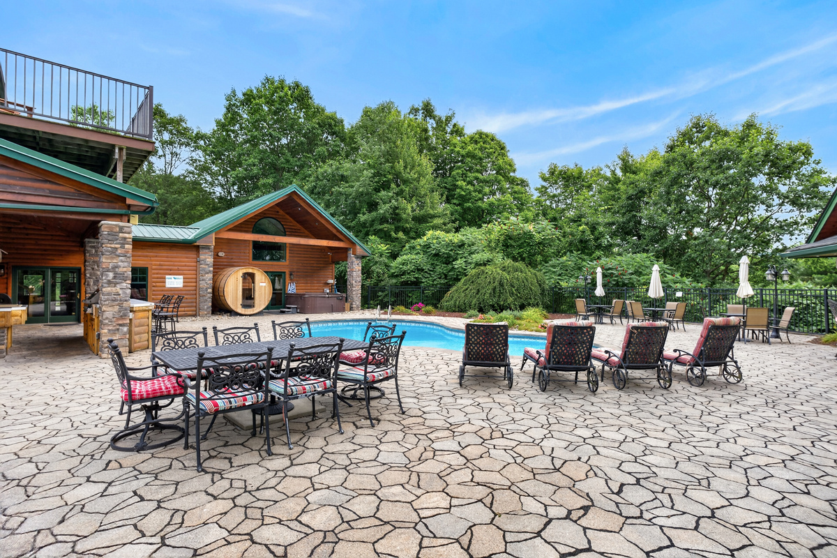 Poolside patio with lounge seating