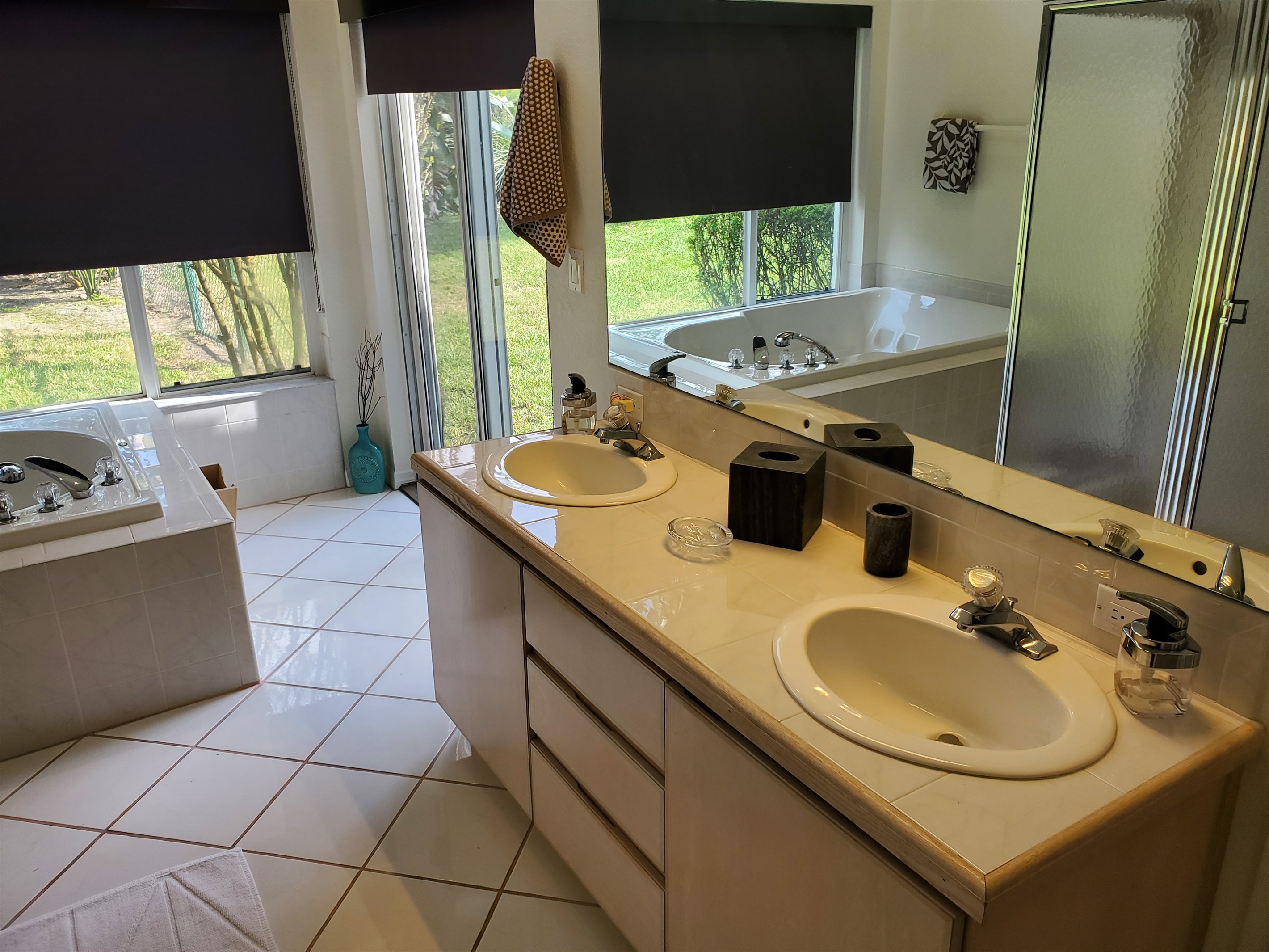 King bathroom with sunk-in tub and walk in shower