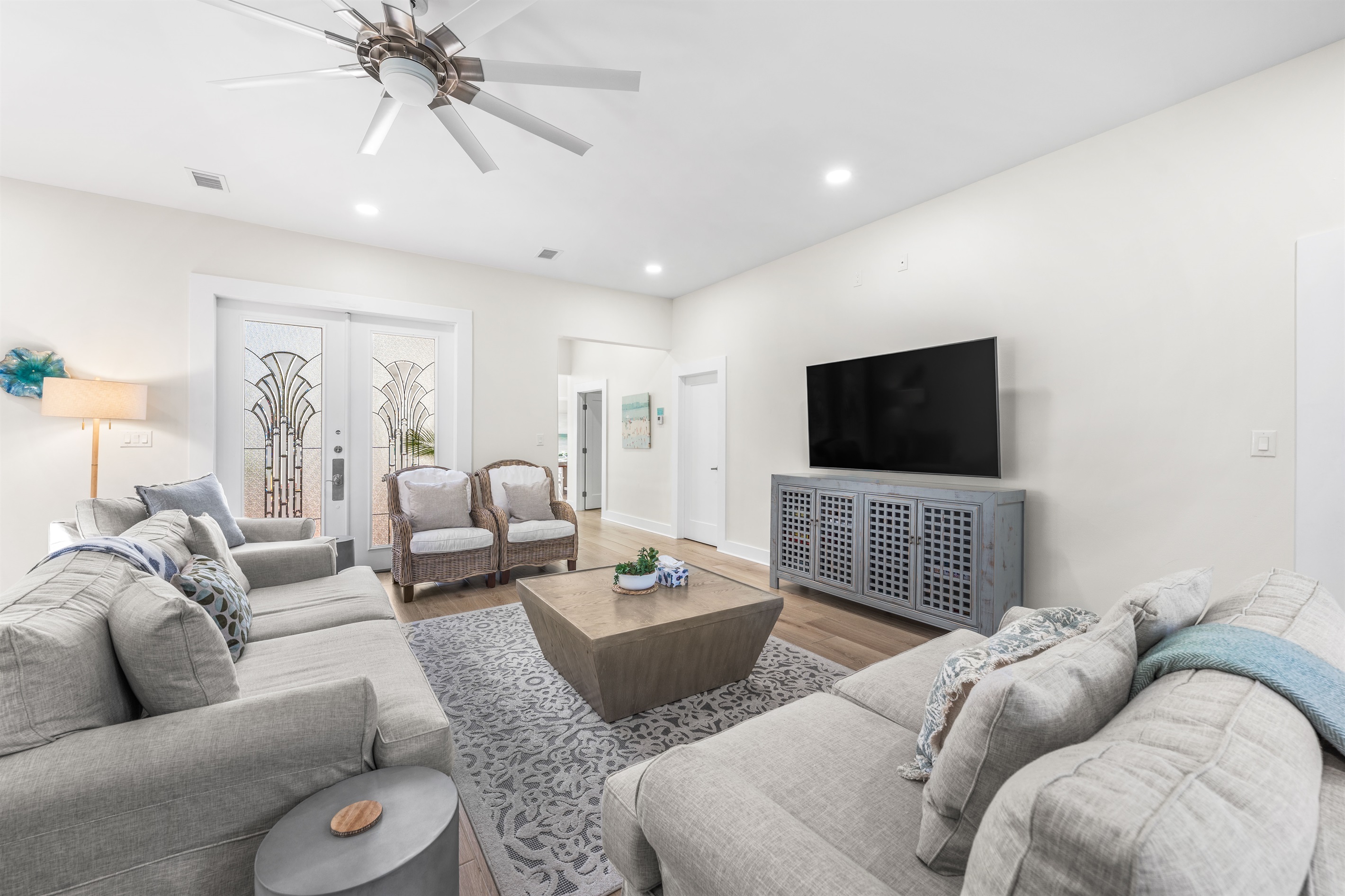 Living room, plenty of seating to relax and socialize together.