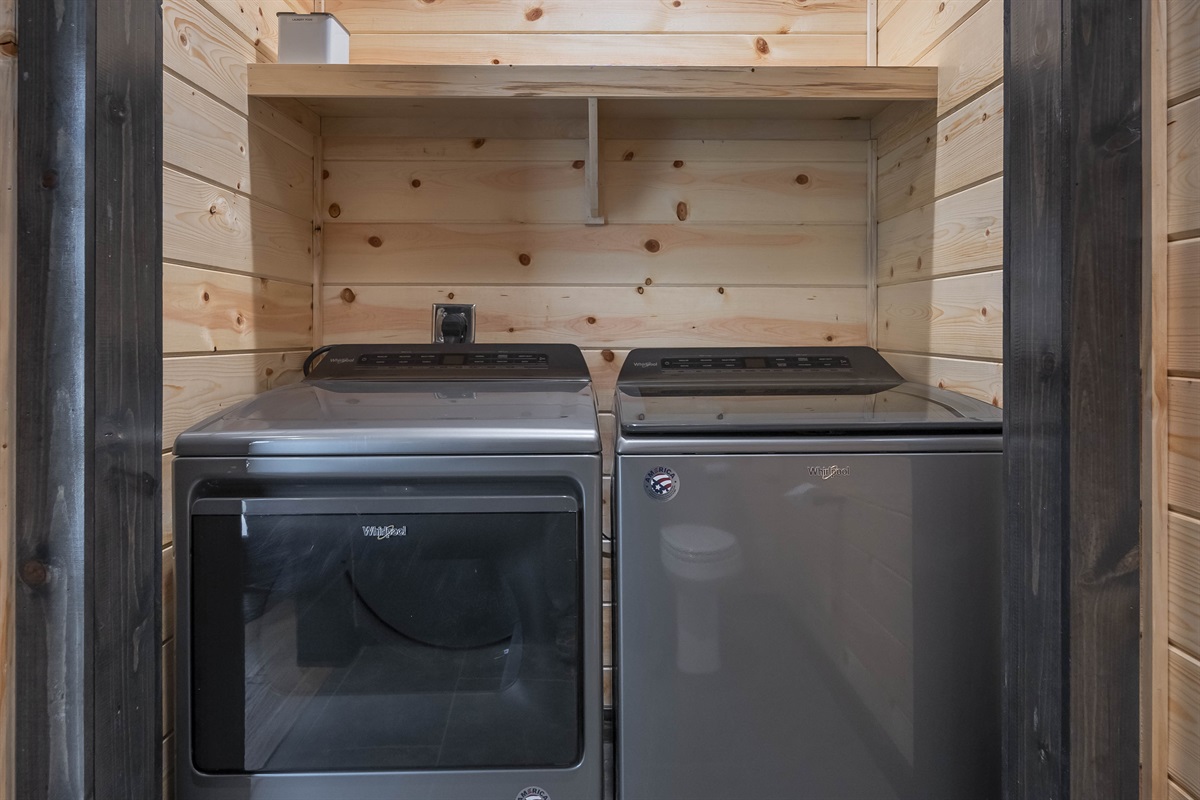 Full size washer and dryer and starter laundry pods provided.