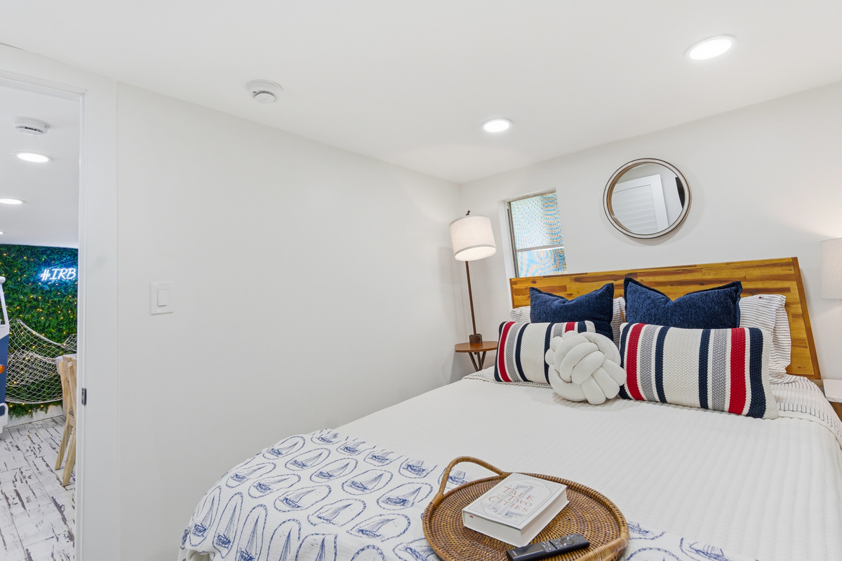 Bedroom #3 with nautical charm and a Queen bed.