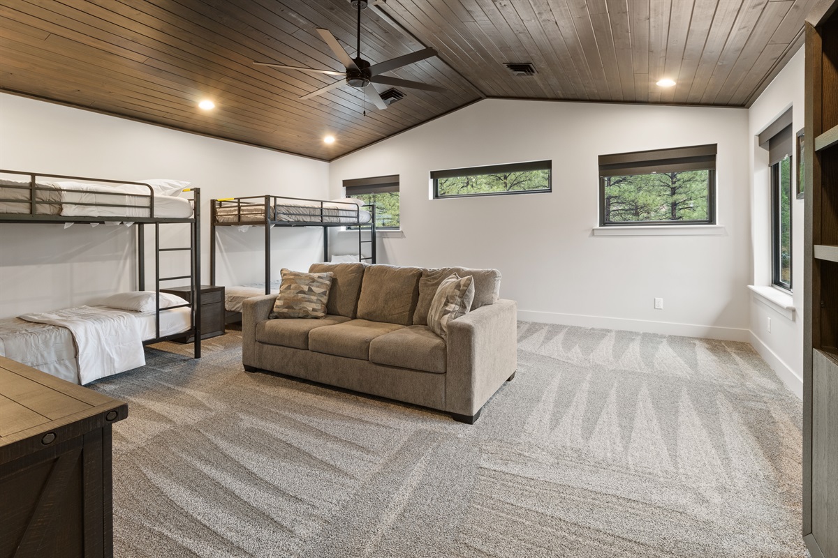 Family-size game bunkroom overlooking the driveway.