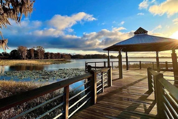 Golden hour at Liberty Park’s lakeside gazebo.