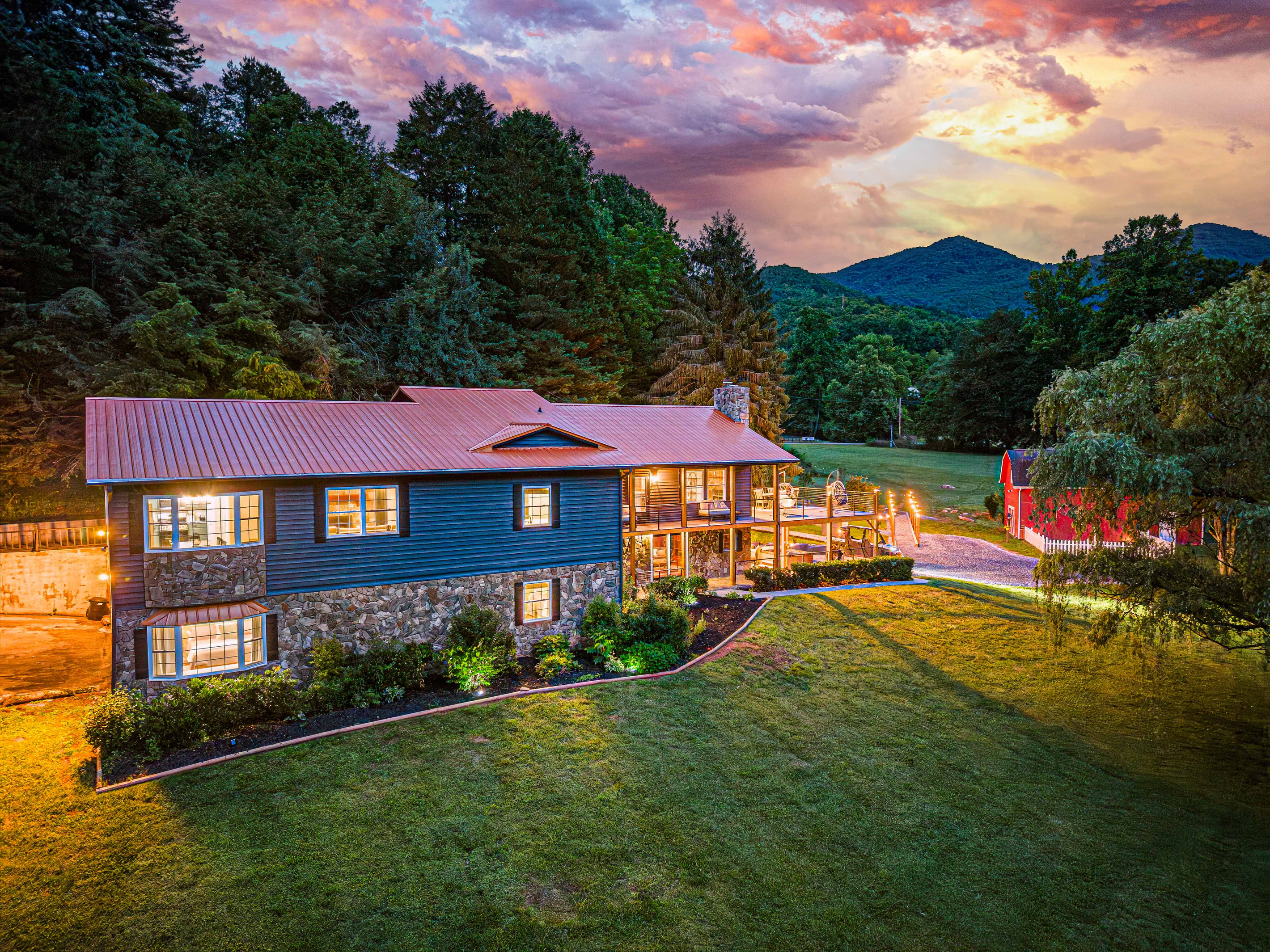 Exterior: Experience breathtaking mountain views and evening glow from this stunning retreat!