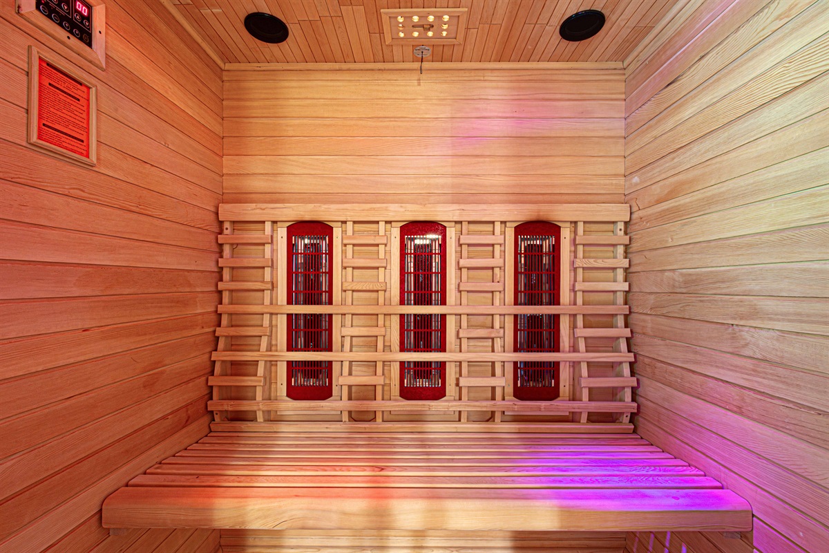 Upstairs Bathroom 2: Sauna Retreat! Relax and unwind in this infrared sauna with sleek wooden design and soothing lights!