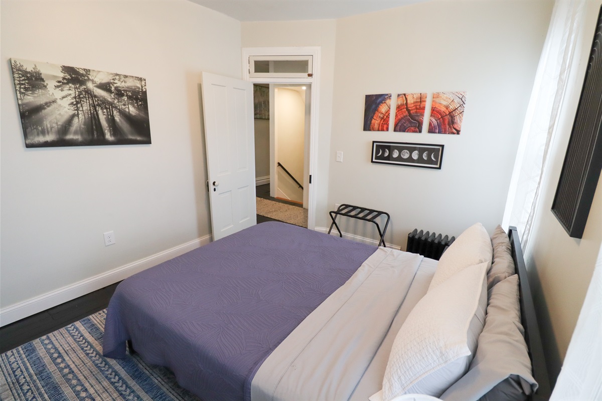 Queen Sized Bed with quality linens