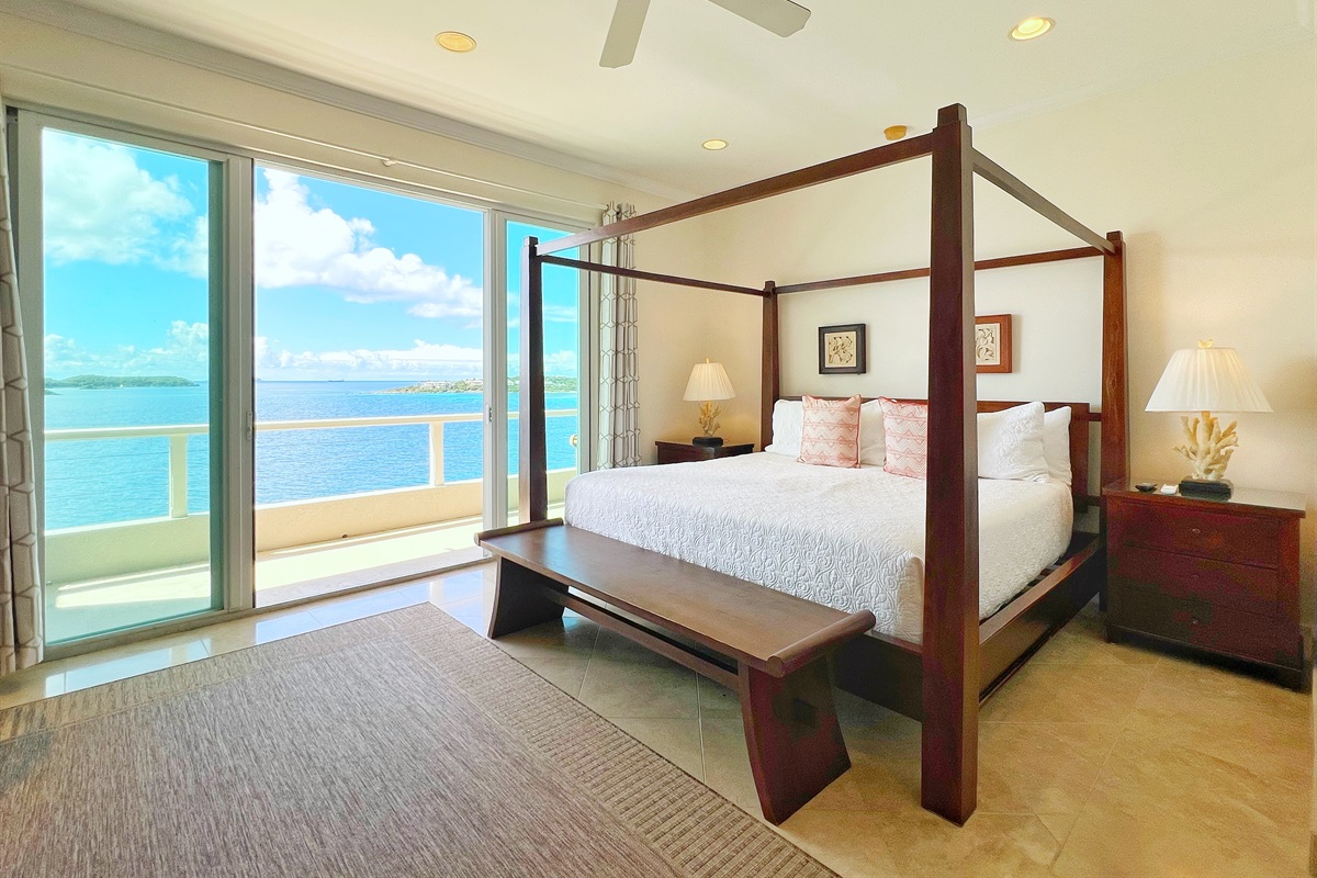 One of the downstairs bedrooms that has access to the shared balcony.