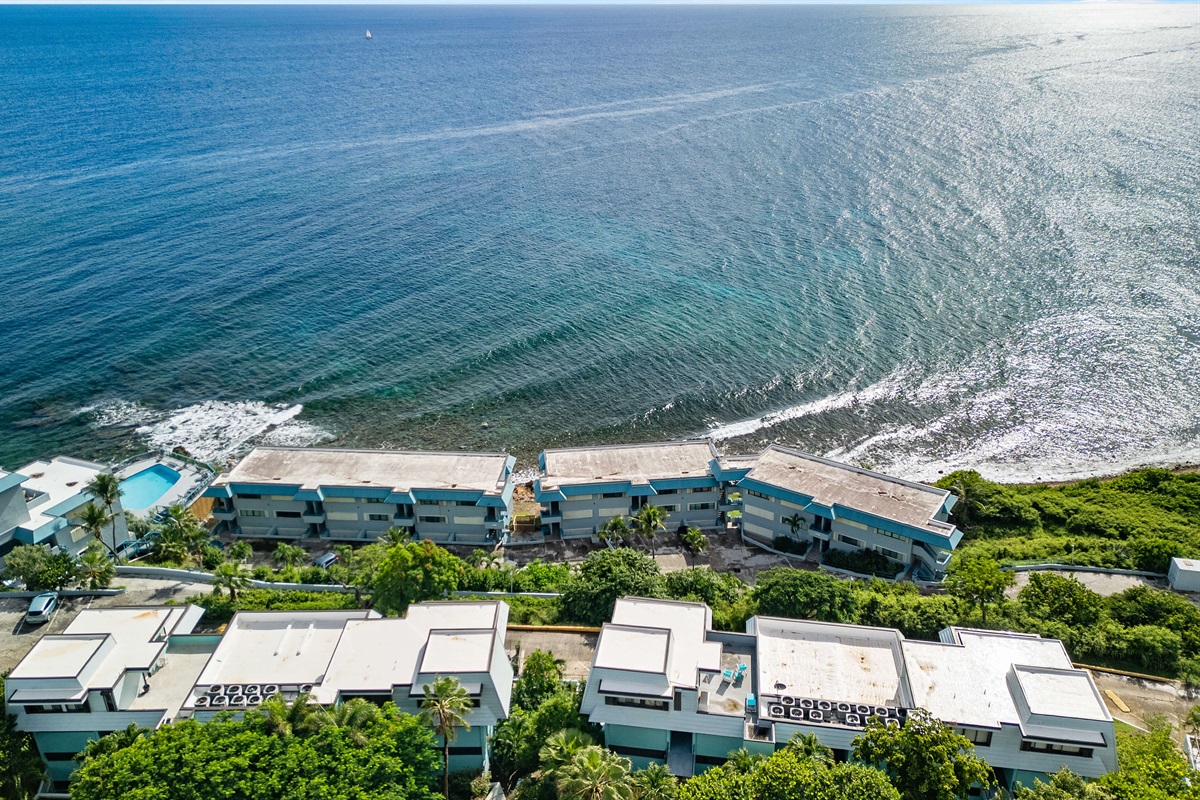 The cliffside pool is located next to building 22