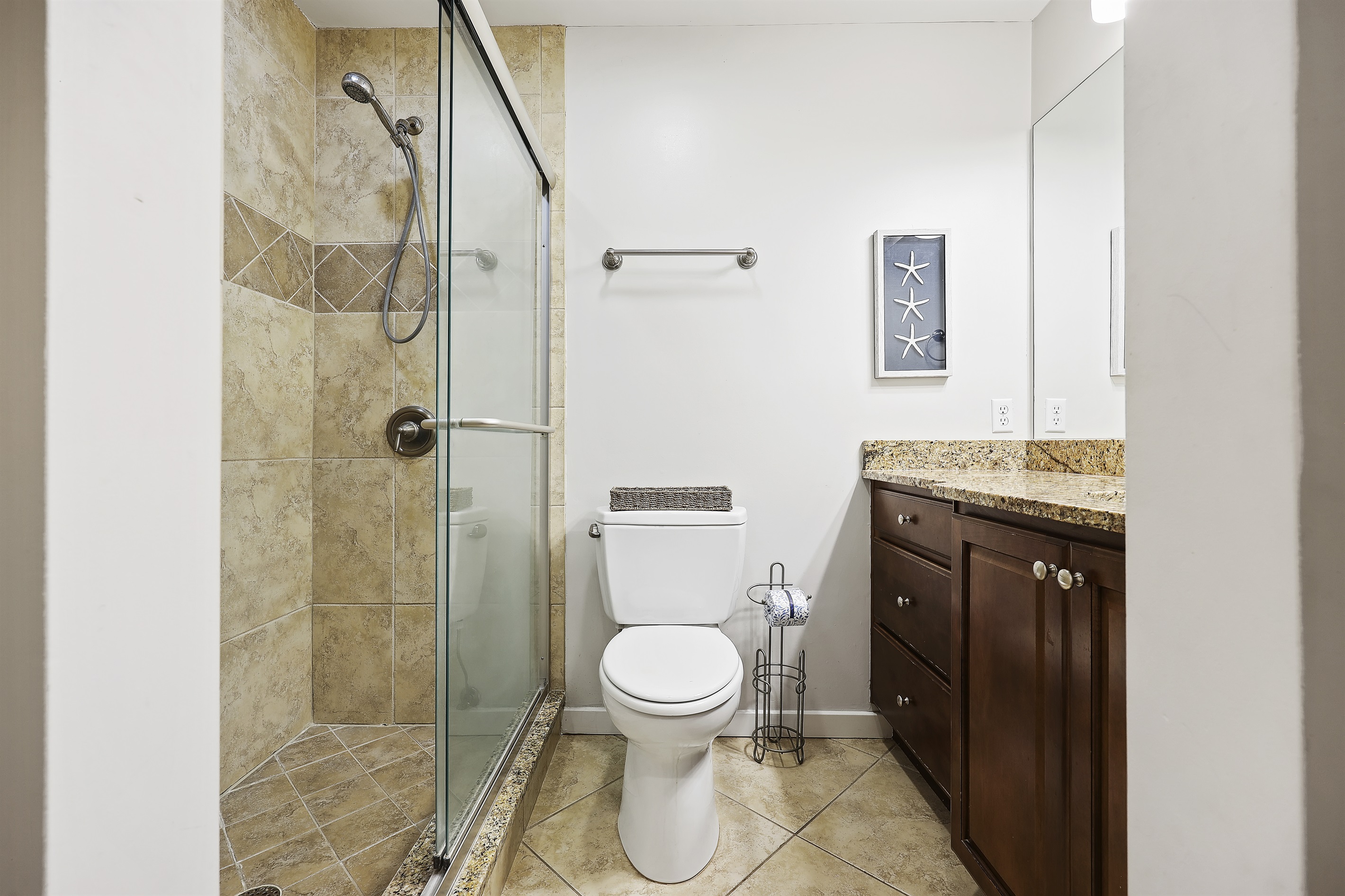 Primary bathroom features a walk-in showerer