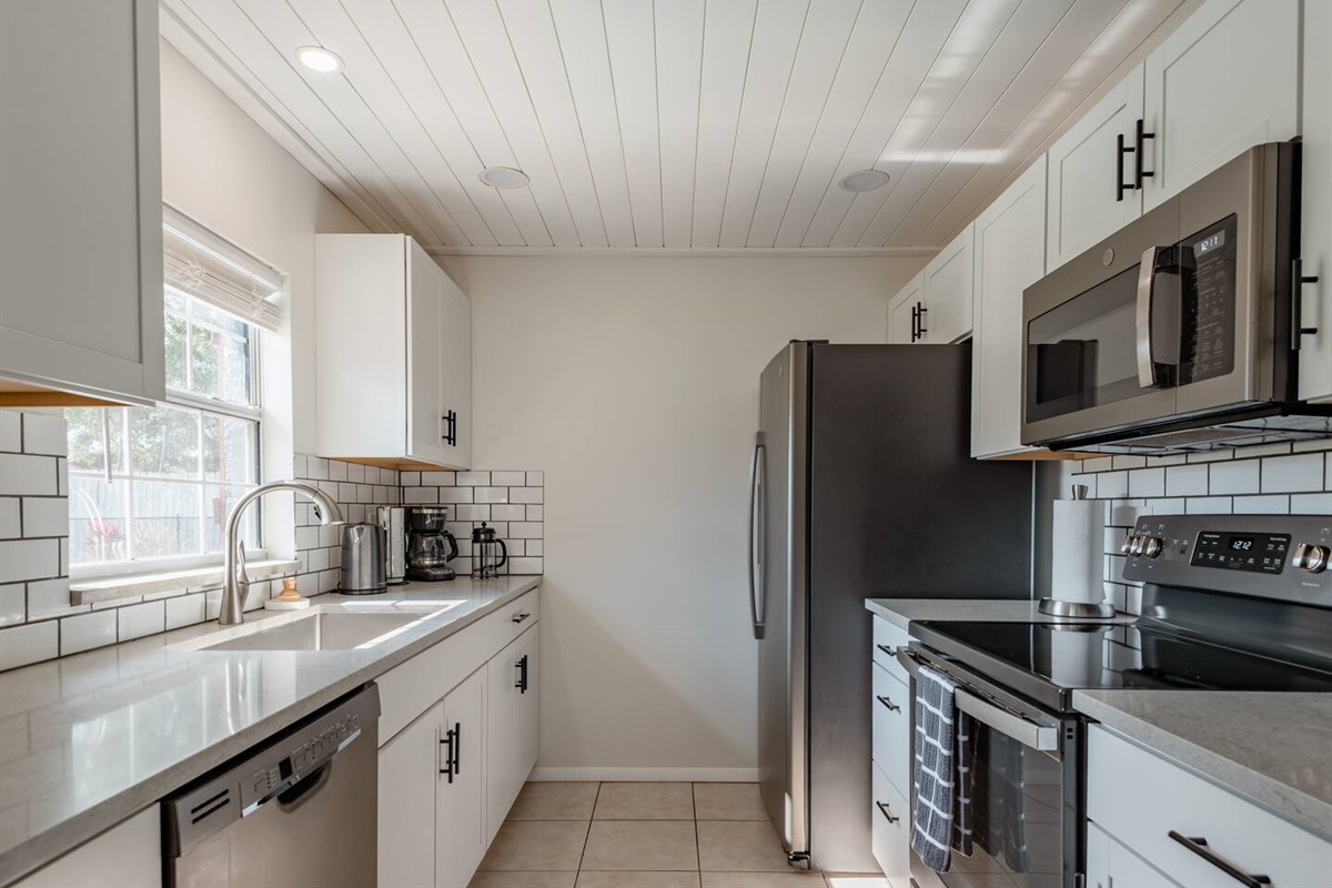 The kitchen comes fully stocked with cookware and utensils,  everything you need to cook up a feast