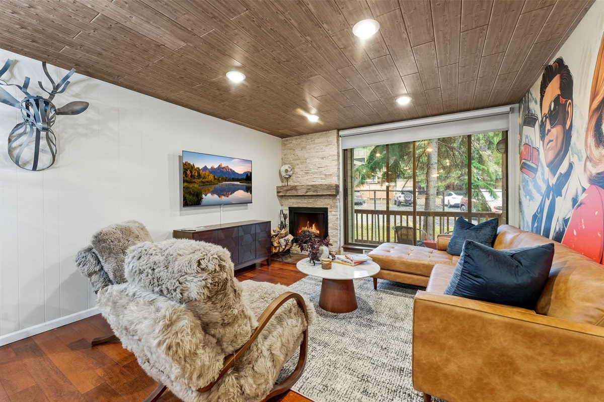 After a day of skiing, this is your corner—fire on, feet up, drink in hand, and your favorite people gathered close while the snow falls outside.