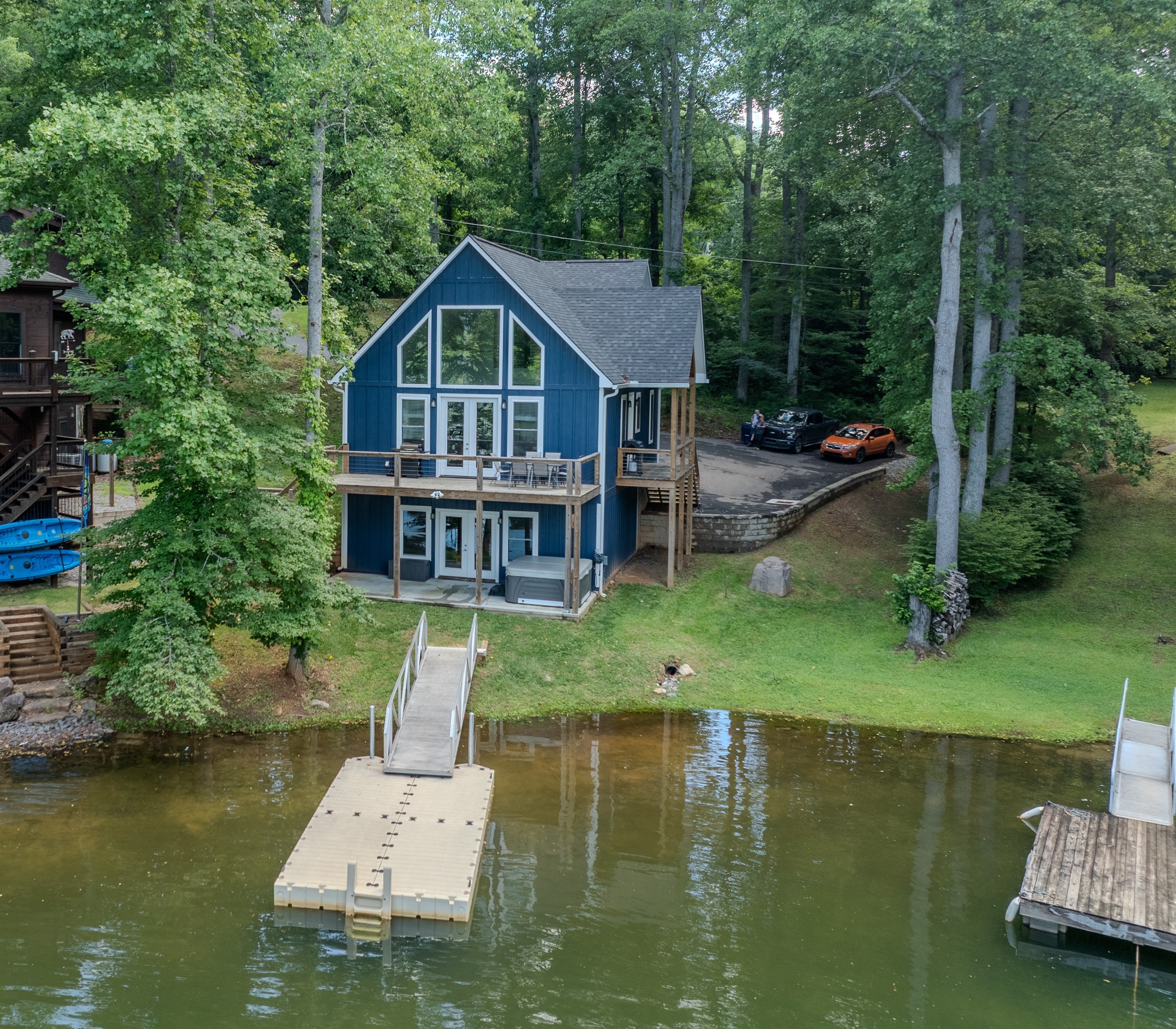 Unwind in a cozy cove retreat: dock, hot tub, and dog-friendly fun await.