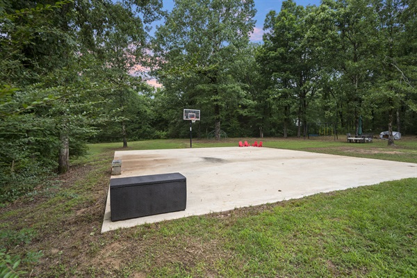 Who wants to play?  Half court NBA court to play ball, ride scooters, or other fun games.