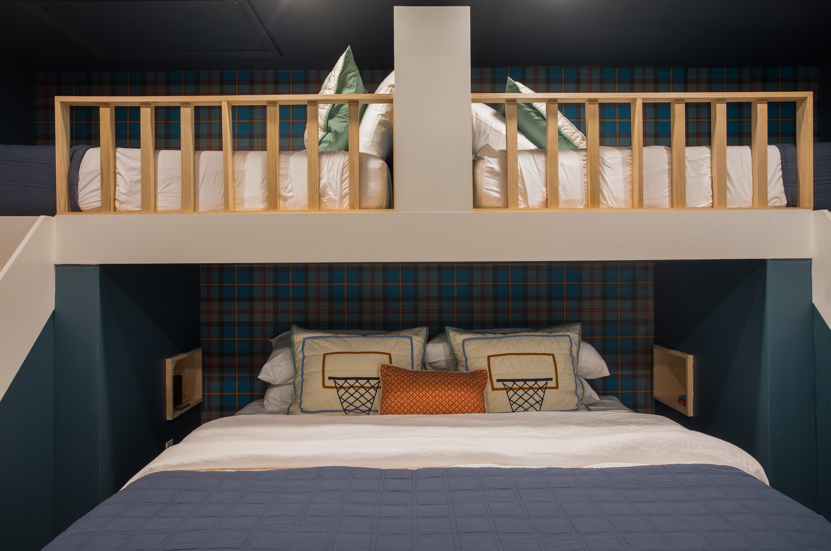 Each bed (and side of bed) has a thoughtfully placed alcove with outlet to ensure everyone is able to charge electronics...cause God forbid right ;)