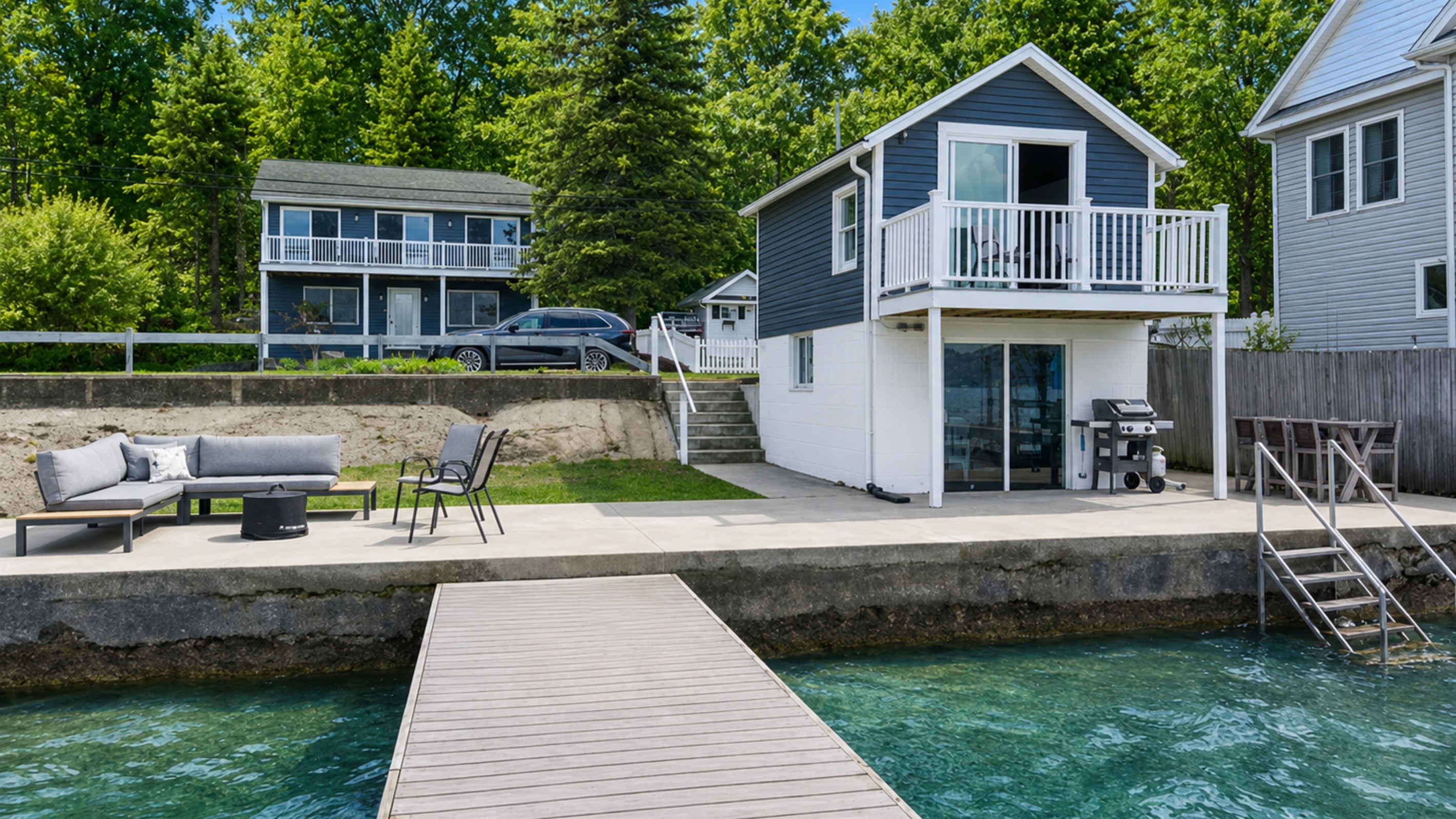 This charming lakeside cottage offers an unbeatable waterfront setting with a spacious patio, cozy fire pit, and your own dock—ideal for relaxing or entertaining. 🏡🔥🌊