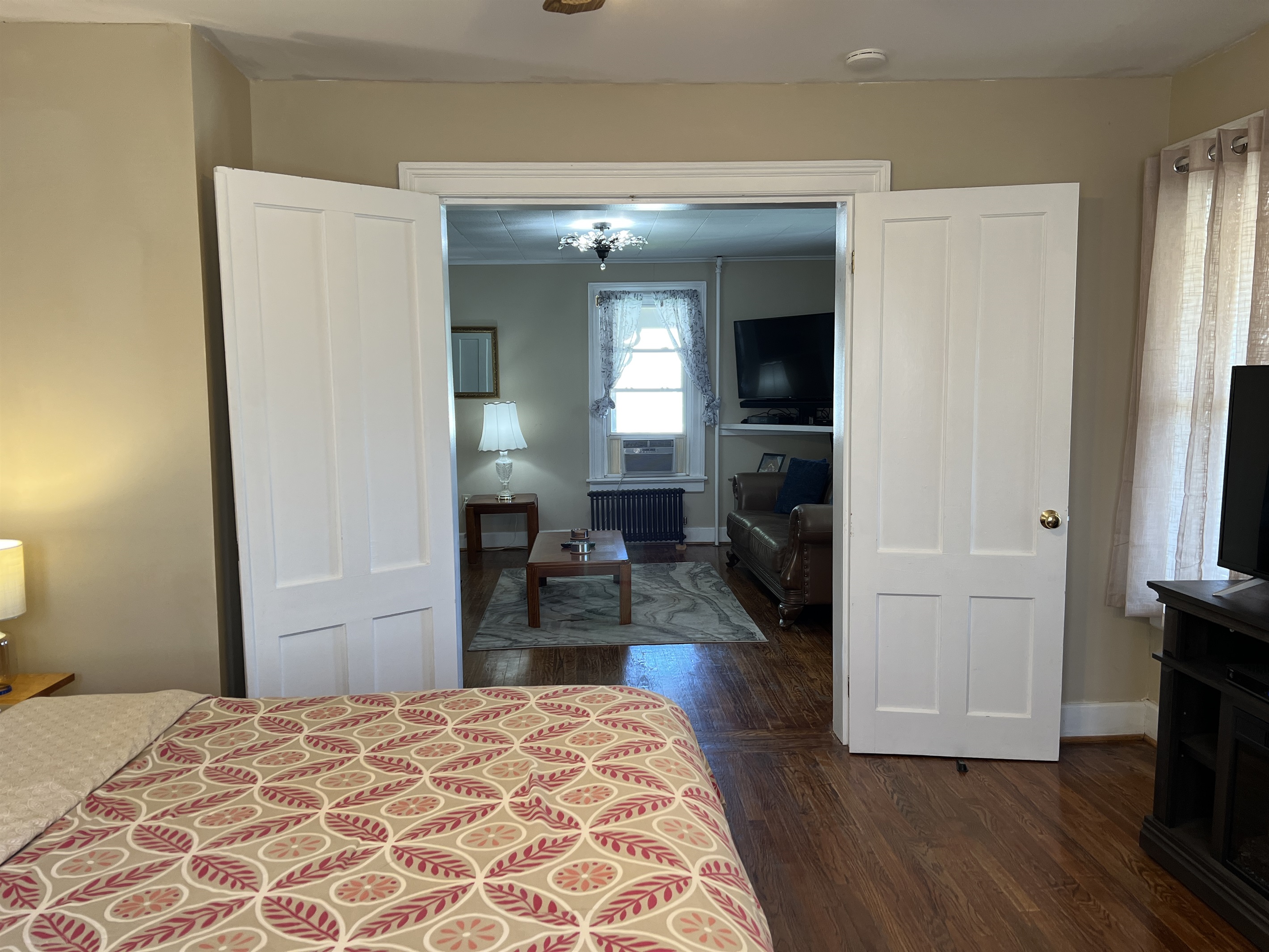 1st floor King bedroom into living room