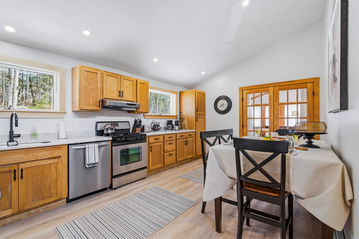 Modern convenience meets rustic warmth: stainless steel appliances and plenty of counter space for family dinners.